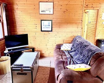 Braemar Lodge Cabins Not for profit - באלאטר - סלון