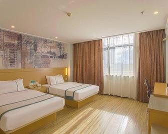 City Comfort Inn Qinzhou Baihaitun Square - Qinzhou - Bedroom