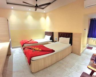 Hotel Relax - Deoghar - Slaapkamer