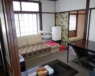 Moriokaguesthouse - Hostel - Morioka - Living room