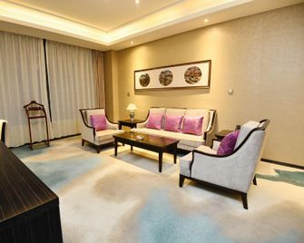 Qicai Hotel - Zhangye - Slaapkamer