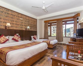 هوتل تولسي - بوخارا - غرفة نوم