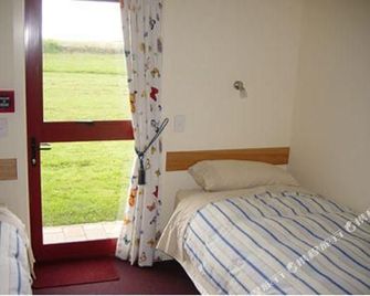 Old Bones Lodge - Oamaru - Спальня