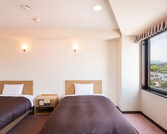 Hotel Primrose Saito - Saito - Habitación