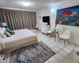 Charming 1-bedroom in Tower Isle St Mary: AC, WiFi, pool, and a serene retreat. - Tower Isle - Habitación