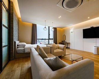 Brown Dot Hotel Ulsan Jangsaengpo - Ulsan - Huiskamer