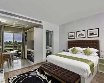 Grand Mercure Vadodara Surya Palace - Vadodara - Schlafzimmer