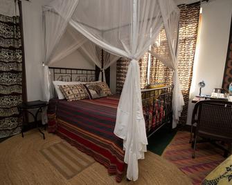 Korona House Hotel - Arusha - Schlafzimmer