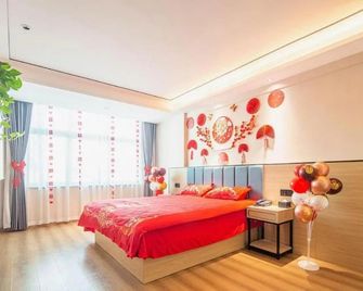 Greentree Inn Henan Zhoukou Luyi Ziqi Avennue Business Hotel - Bozhou - Спальня