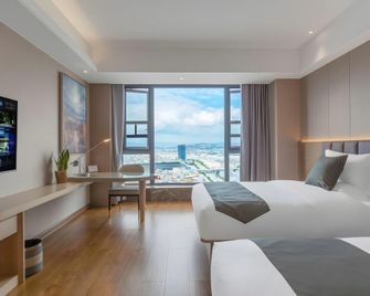 Gya Hotel Kunming Zijin Center Xiaodongcun Metro Station - Kunming - Habitación