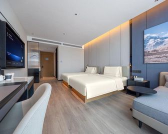 Atour Hotel Qingdao Haier Science and Technology Innovation Ecological Park - Qingdao - Bedroom