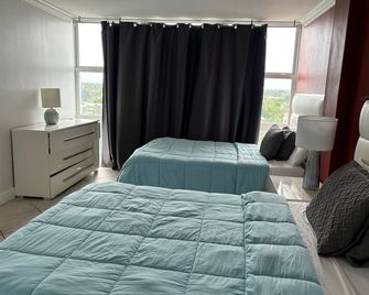 Tortuga festival special 1Bedroom Suite,CityView Ft Lauderdale&Two QueenBeds - فورت لاودردال - غرفة نوم
