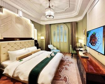 China Garden Hotel - Túc Châu - Phòng ngủ
