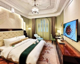 China Garden Hotel - سوزهو - غرفة نوم