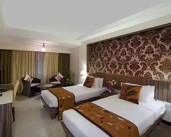 Kapila Business Hotel - Pune - Bedroom