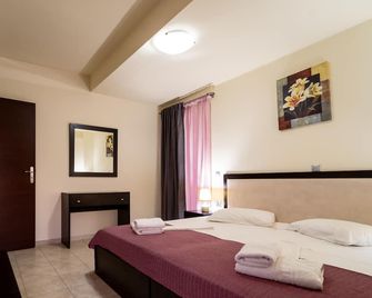Golden Rose Suites - Chania - Schlafzimmer