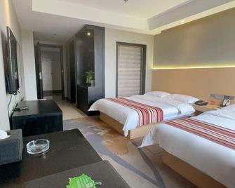 Fengqiao Yingke Business Hotel - Anyang - Schlafzimmer