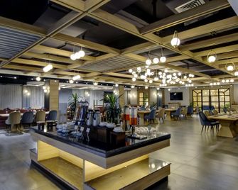 Cozzet Sonipat - A Cygnett Hotel - Sonepat - Restaurante