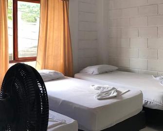 Casa Hotel Los Kunas - Capurganá - Schlafzimmer