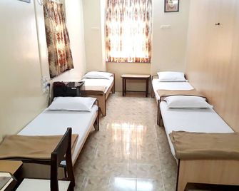 Milan Guest House - מומבאי - חדר שינה