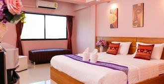 Airbest Gemtree Lampang Hotel - Lampang - Bedroom