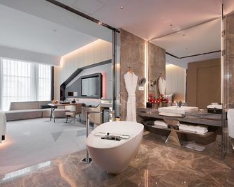 K · International Hotel - Nanning - Camera da letto