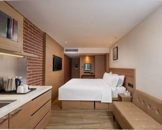 Zanzan Hotel - Yantai - Makuuhuone