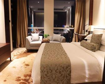 Mr.D Hotel - Linyi - Slaapkamer
