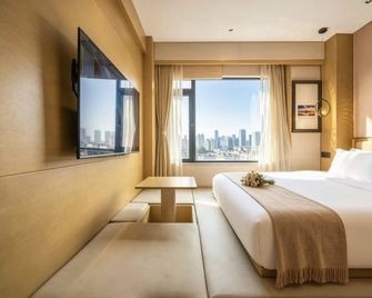 Ai·Lanting Hotel (Handan Road Branch) - Handan - Schlafzimmer