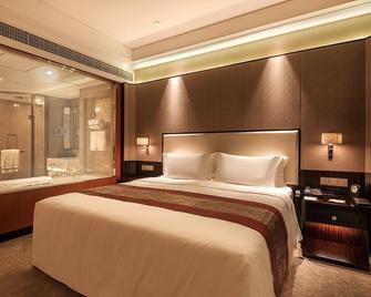 Howard Johnson Jinyi Hotel Chongqing - Chongqing - Makuuhuone