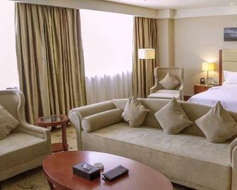 Dachang International Hotel(Taiyuan South Station Nanzhonghuan Street) - Taiyuan - Slaapkamer