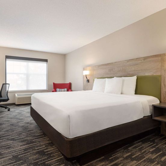 Bedroom view of Country Inn & Suites by Radisson, St Cloud E, MN