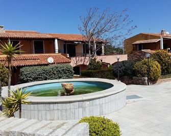 Three-room Apartment Giardino 'Il Borgo' a few steps from the sea - Palau - Piscina