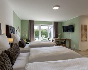 GLEUEL INN - digital hotel & serviced apartments & boardinghouse mit voll ausgestatteten Küchen - Hürth - Schlafzimmer