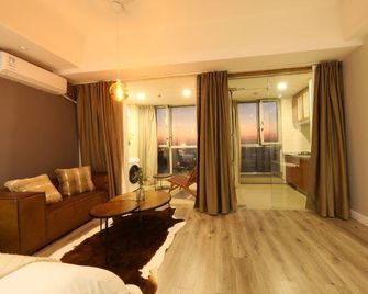 Suju Service Apartment (Shanghai International Tourism and Resorts Zone Zhoupu Wanda) - Shanghai - Soggiorno