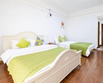 Yisuli Hotel (Dalian Hi-tech Wanda Plaza) - Dalian - Sala de estar