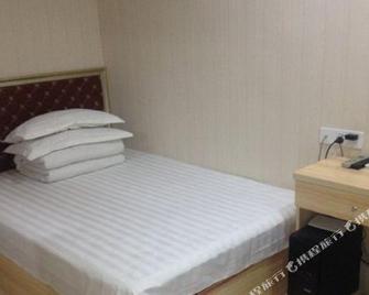 Guang'an Jiaxing Guest House - Guang'an - Habitación