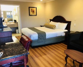 Dynasty Suites Hotel Riverside - Riverside - Quarto