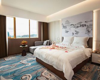 Dragon City International Hotel - Heyuan - Camera da letto