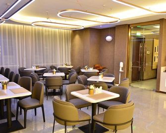 Home Inn Plus Lianyungang Donghai Pedestrian Street High Speed Rail Station - Lianyungang - Restaurant