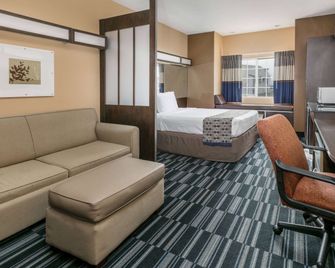 Microtel Inn & Suites by Wyndham Scott Lafayette - Scott - Schlafzimmer