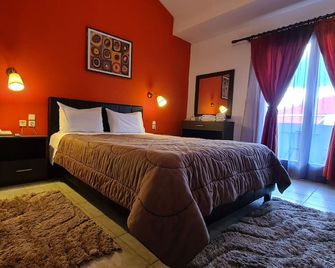 Hotel Odysseas - Kalivia - Habitación