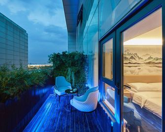 Vienna Hotel Xi'an Olympic Sports International Convention and Exhibition Center - Xi'an - Balcón