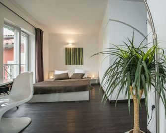 Appart Hôtel des Capucins - Le-Puy-en-Velay - Schlafzimmer