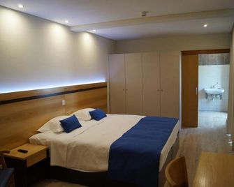 Angra Central Hotel - Angra do Heroismo - Ložnice