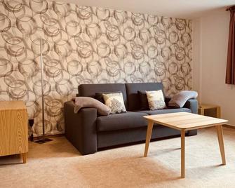 Tulip holiday apartment - Brigitte's holiday apartments in the Harz Mountains - Clausthal-Zellerfeld - Wohnzimmer