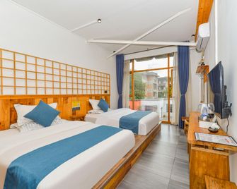 Original Wood Residence Factory Hotel (Guilin Branch) - Guilin - Slaapkamer