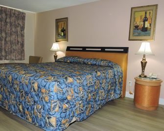 American Inn - Las Vegas - Bedroom