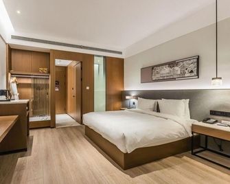 Xuzhou Suning Yayue Hotel (Pengcheng Plaza ) - Xuzhou - Bedroom