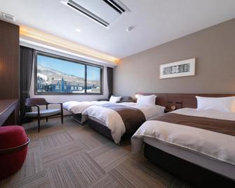 Hotel Munin Furano - Furano - Спальня